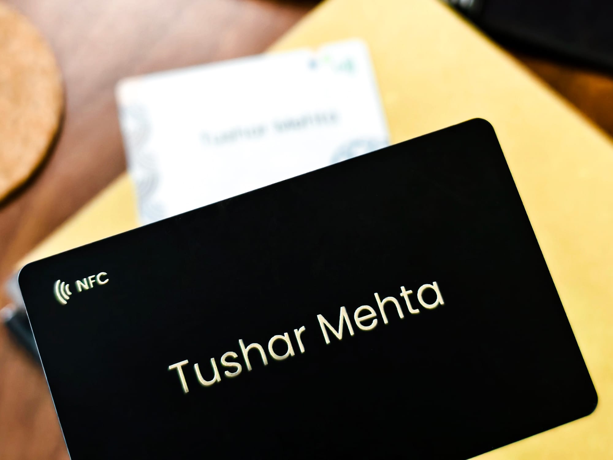 mTap NFC black premium business card and networking tool.