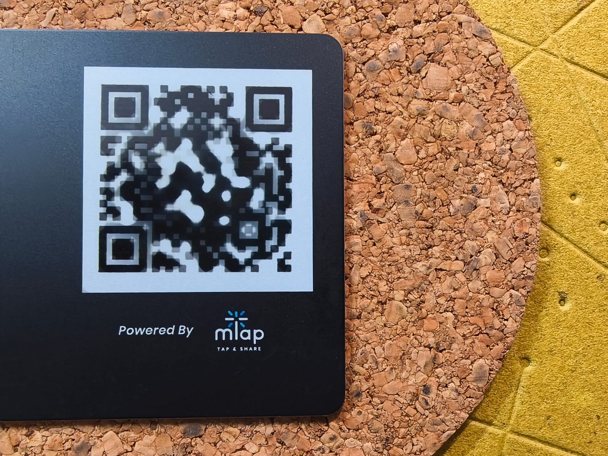 mTap NFC black premium business card and networking tool.